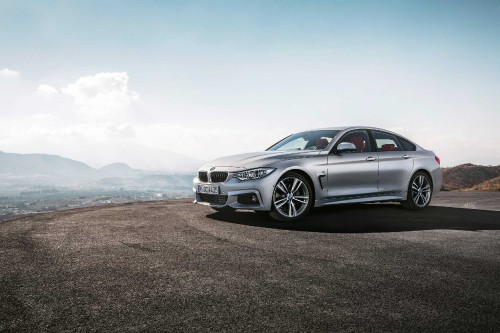 Image silver bmw m 3 on brown sand during daytime