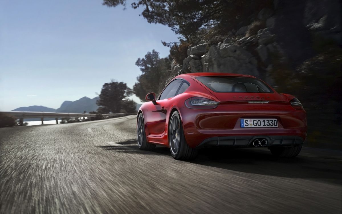 Porsche 911 Rojo en la Carretera Durante el Día. Wallpaper in 2560x1600 Resolution