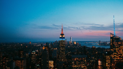 Image aerial view of city buildings during night time