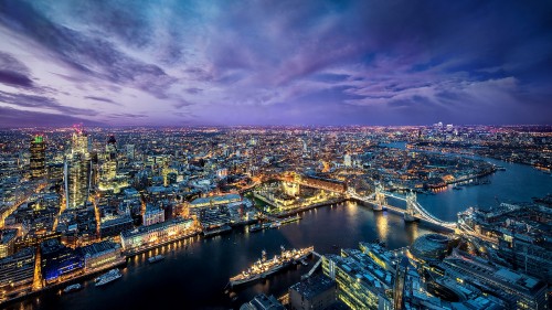 Image aerial view of city buildings during night time