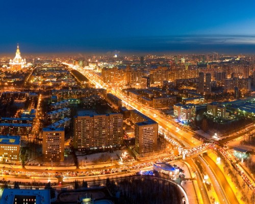 Image aerial view of city buildings during night time