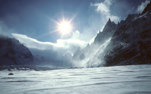 Image snow covered mountain under blue sky during daytime