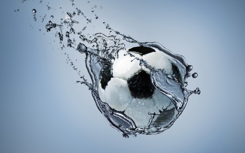 Image white and black ball on water