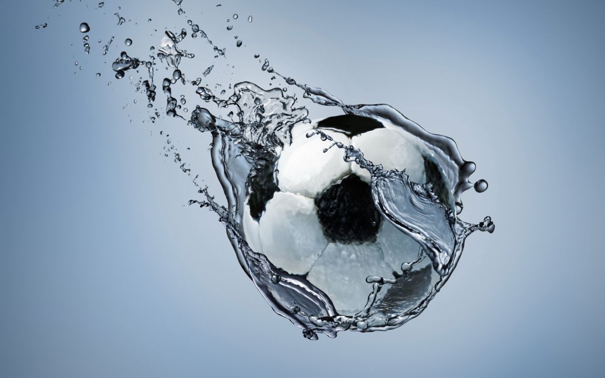 white and black ball on water