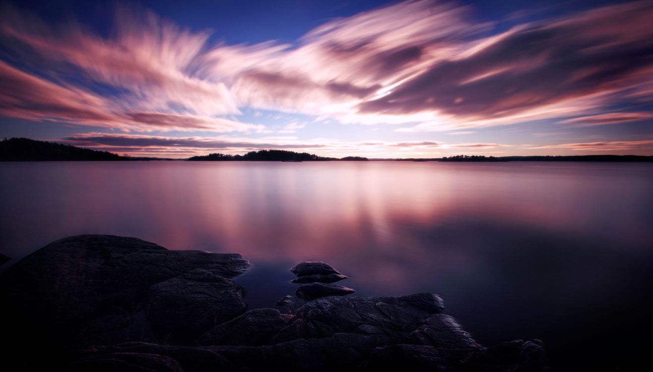 Calm Water Under Blue Sky During Daytime. Wallpaper in 5096x2900 Resolution