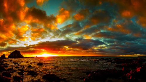 Image body of water under cloudy sky during sunset