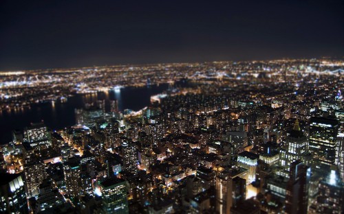 Image aerial view of city buildings during night time