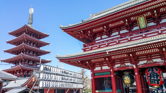 Image red and white temple during daytime
