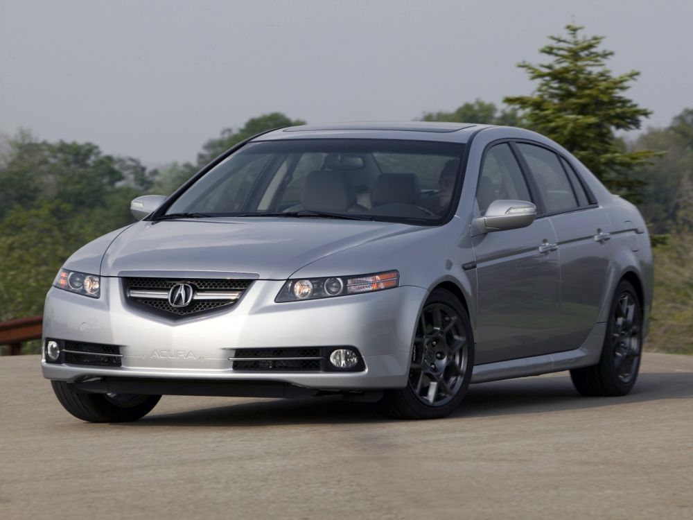 black honda sedan on road during daytime