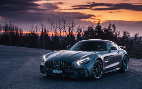 Image black mercedes benz coupe on road during sunset