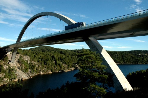 Image white bridge over river during daytime