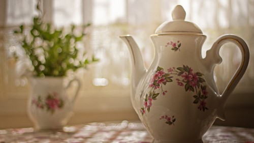 Image white and pink floral ceramic teapot