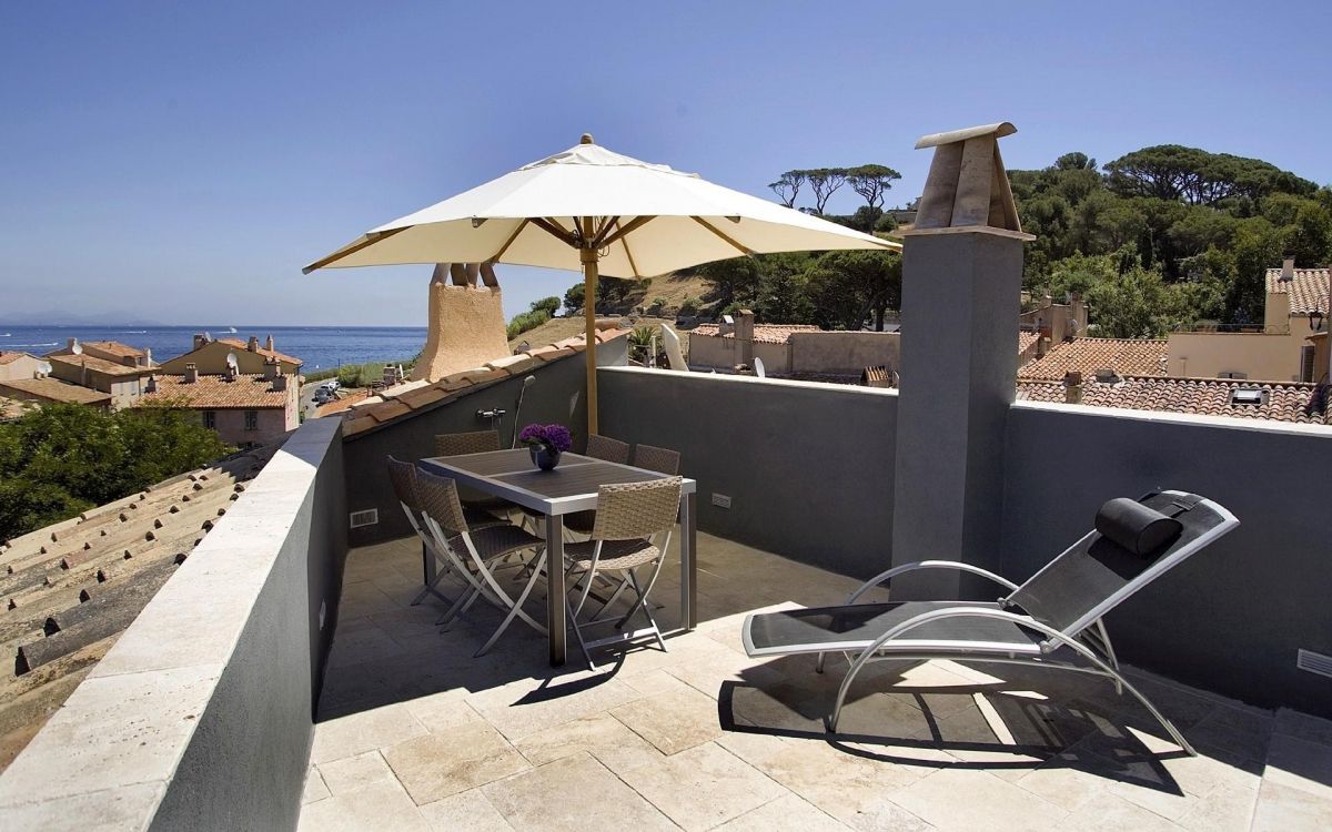 white and blue patio umbrella