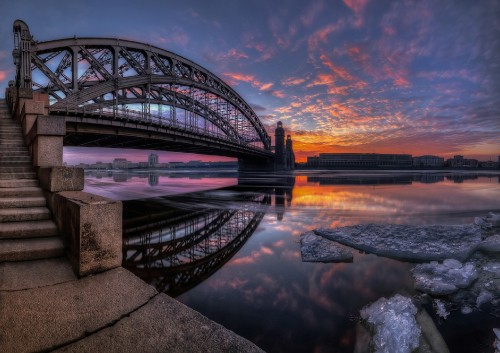 Image body of water under blue sky during sunset