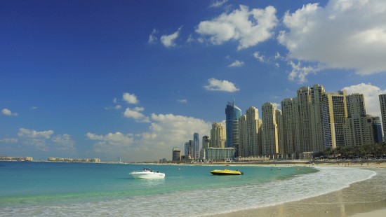 Image city skyline across the sea during daytime