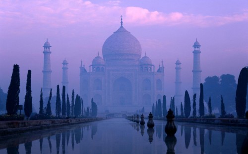 Image white dome building near body of water during daytime