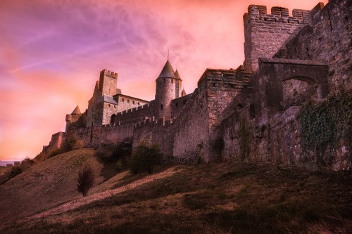 Image gray concrete castle under cloudy sky