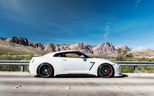 Image white porsche 911 on road during daytime