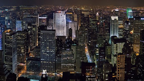 Image aerial view of city buildings during night time