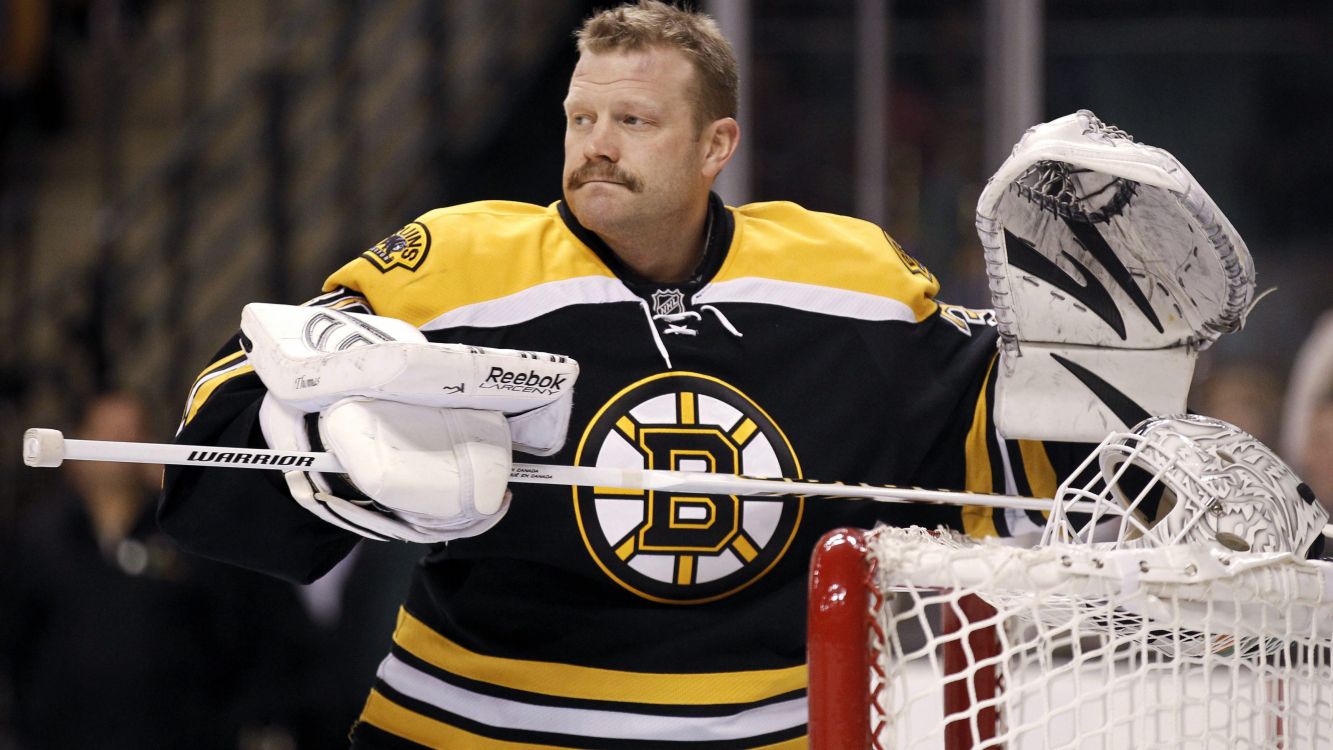 man in black and yellow jersey shirt