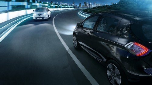 Image black car on road during night time