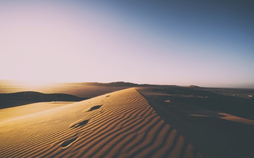 Image brown sand dunes during daytime