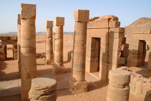 Image brown concrete pillars during daytime