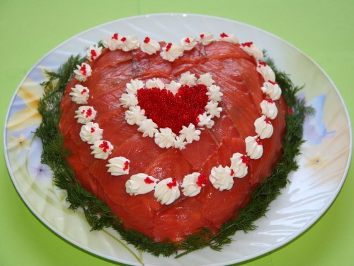 Image red and white cake on white ceramic plate