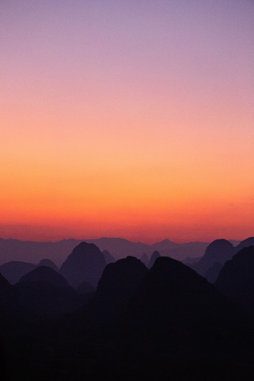 Image silhouette of mountains during sunset