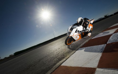 Image man riding on black and white sports bike