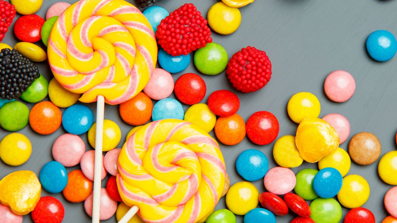 Premium Vector  Sweet snack seamless pattern candy lollipop wallpaper