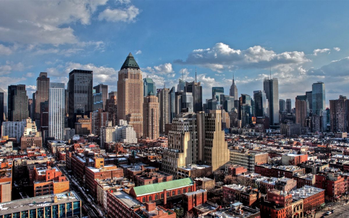 city buildings under blue sky during daytime