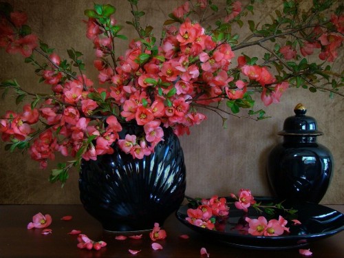 Image pink flowers on blue ceramic vase