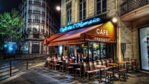 Image people sitting on chair outside restaurant during daytime