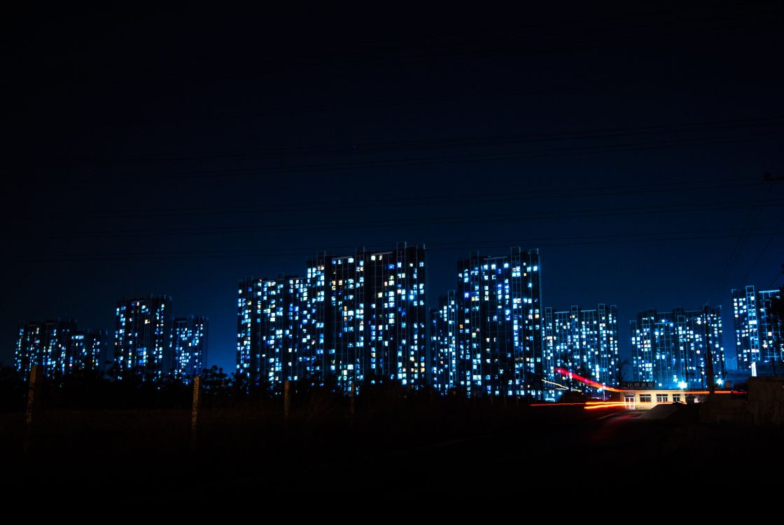 city skyline during night time