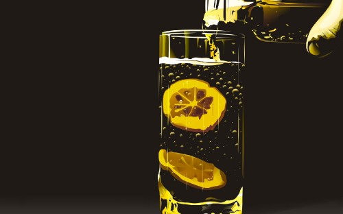 Image clear drinking glass with yellow liquid