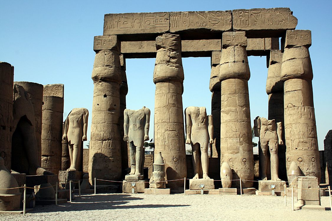 brown concrete statues during daytime