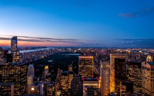 Image aerial view of city buildings during night time