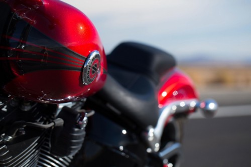 Image red and black motorcycle on road during daytime