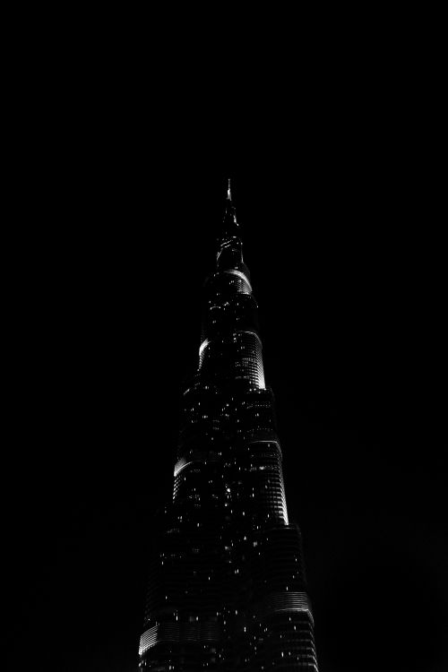 Black Tower With Lights During Night Time. Wallpaper in 3569x5353 Resolution