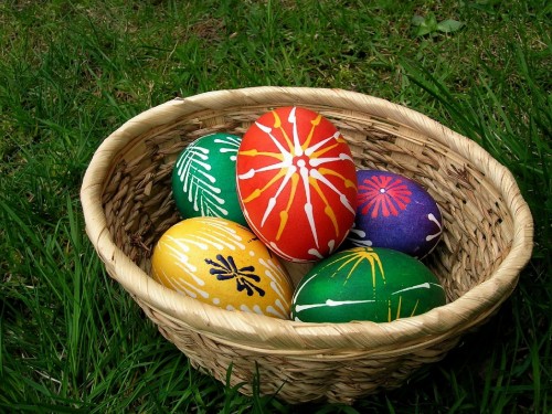 Image easter eggs in brown woven basket