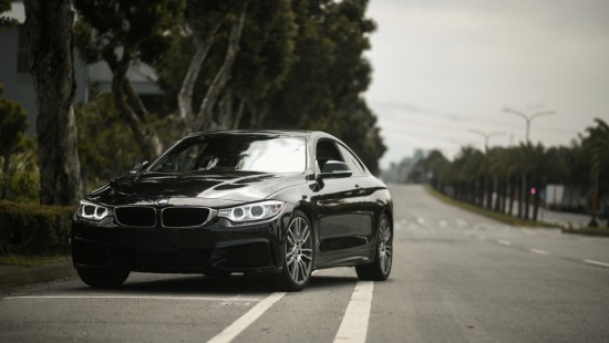 Image black mercedes benz coupe on road