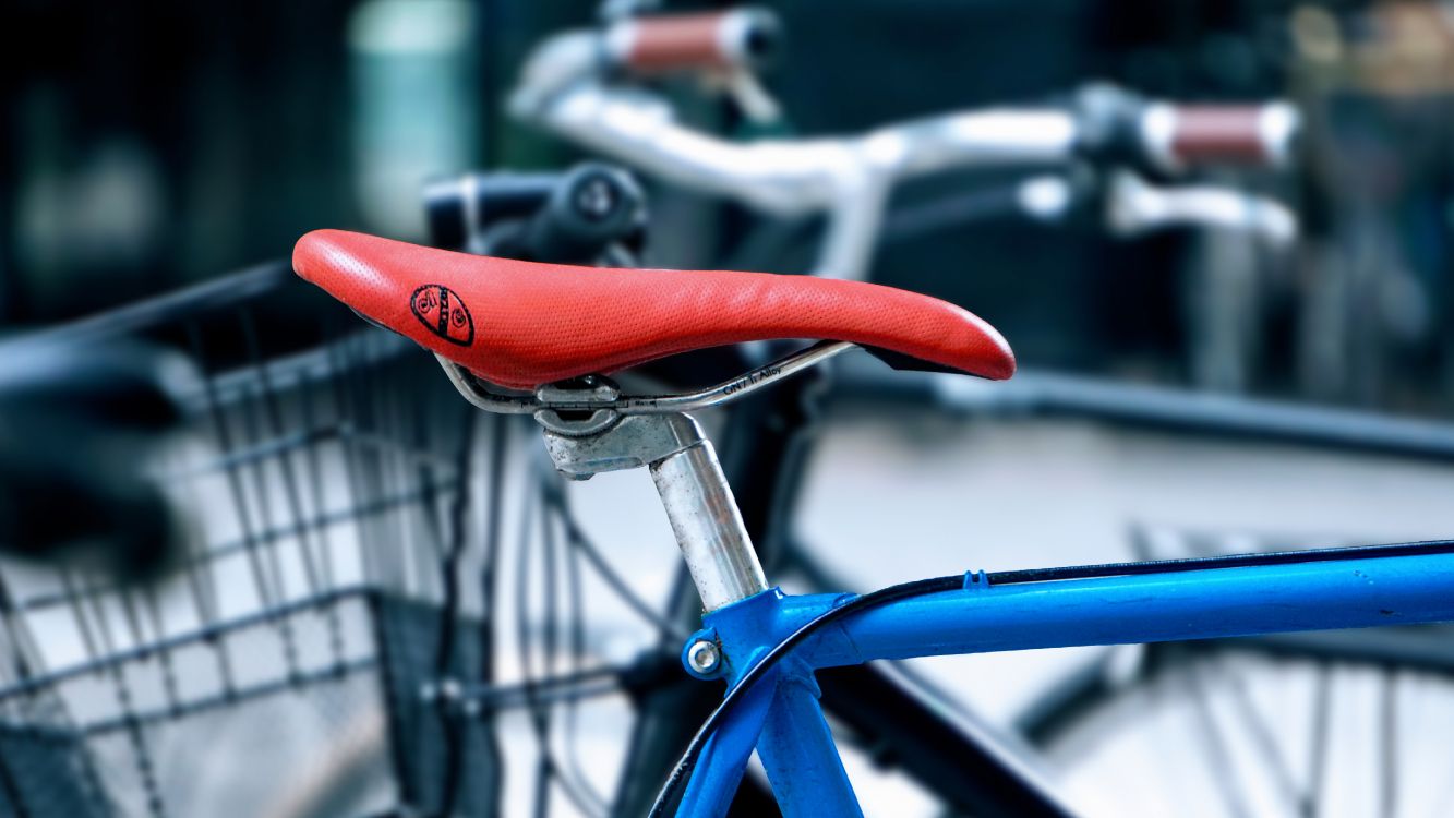 blue and red bicycle in tilt shift lens