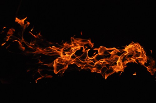 Image fire in black background with black background