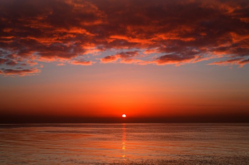 Image body of water during sunset