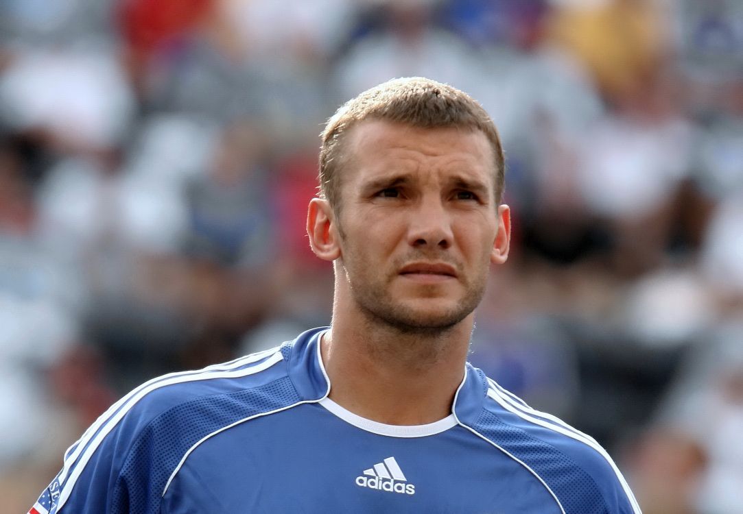 man in blue and white nike soccer jersey