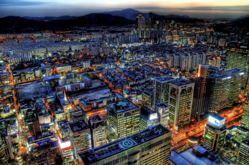 Image aerial view of city buildings during night time