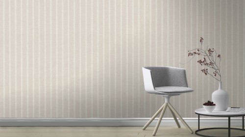 Image gray and white chair beside white wall