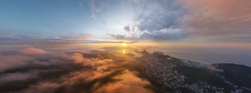 Image aerial view of city during sunset