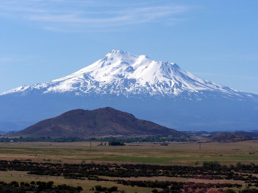 snow covered mountain under blue sky during daytime